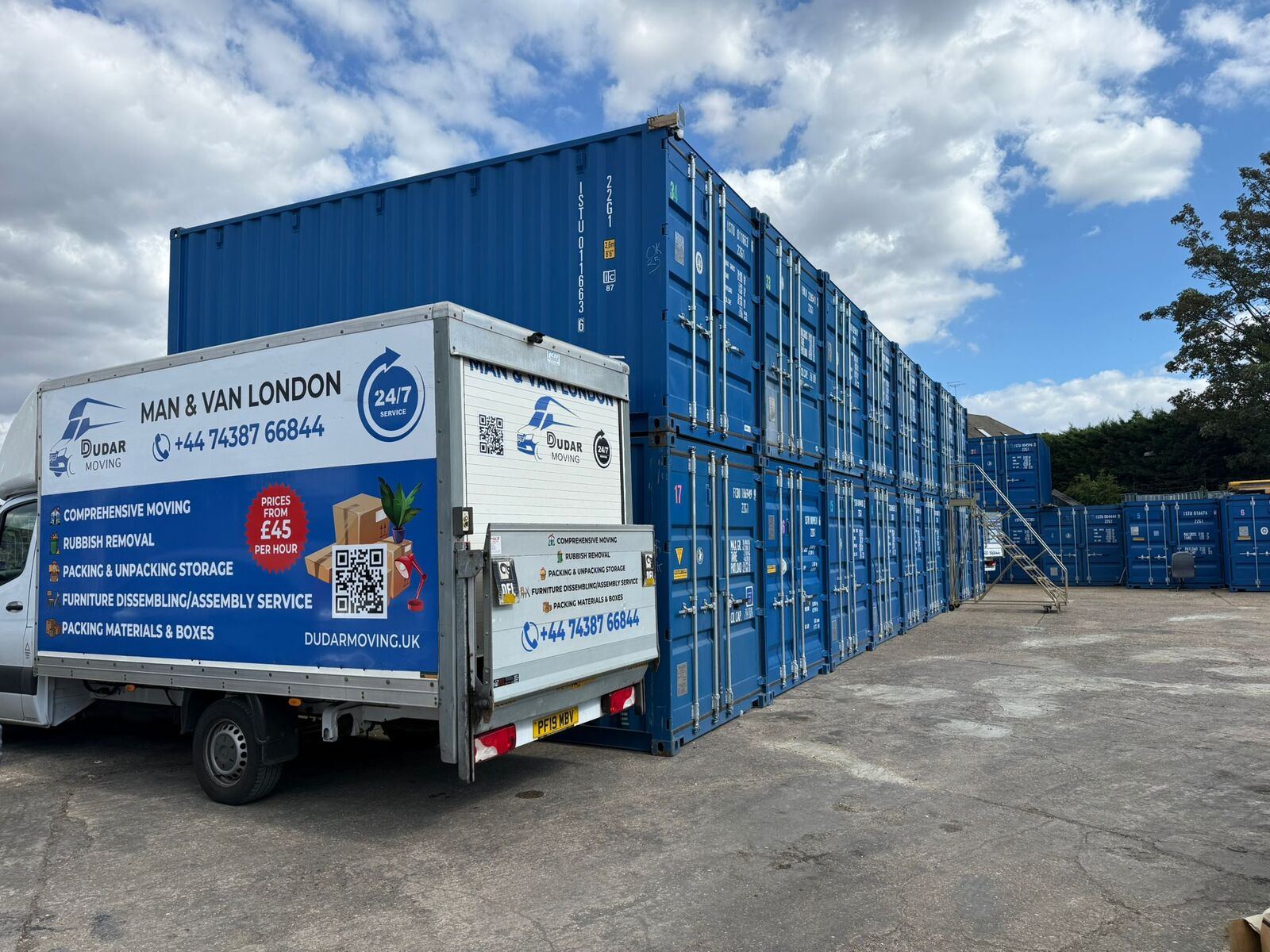 Rows of secure blue storage containers at our London yard, with our collection van ready to move belongings